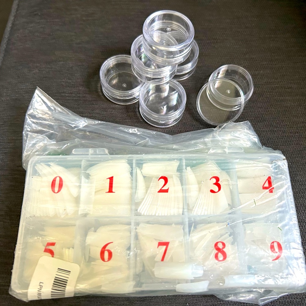 Case of Nails 💅🏼 and 6 clear plastic round cases.